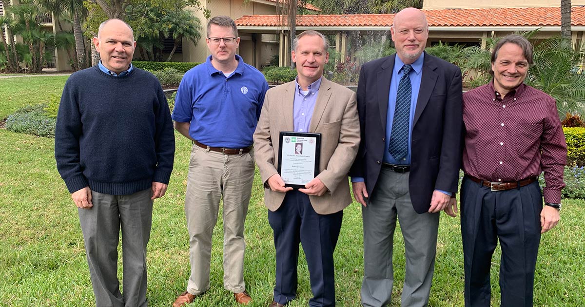 Robert J. Connor receives the 2020 Richard S. Fountain Award. Pictured from left to right: Ronnie Medlock, High Steel Structures LLC; Chris Garrell, National Steel Bridge Alliance; Robert Connor, Purdue University; Mike Grubb, M.A. Grubb & Associates LLC; and Tom Macioce, Pennsylvania Department of Transportation. Photo by Dan Snyder, AISI.